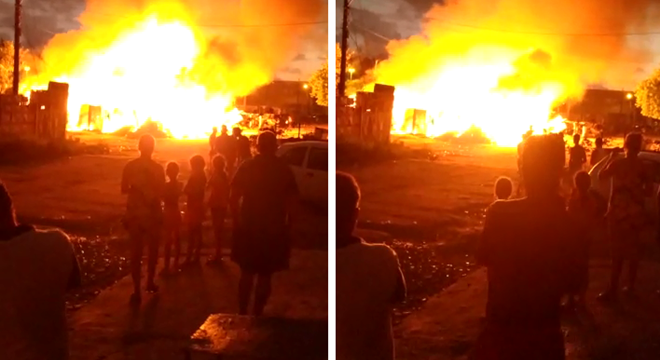 Incêndio atinge barracos de loteamento na parte alta de Maceió — © Reprodução