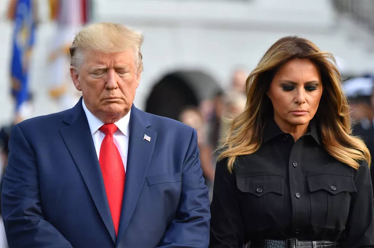 O presidente e a primeira-dama dos EUA, Donald e Melania Trump — © Nicholas Kamm/AFP Photo