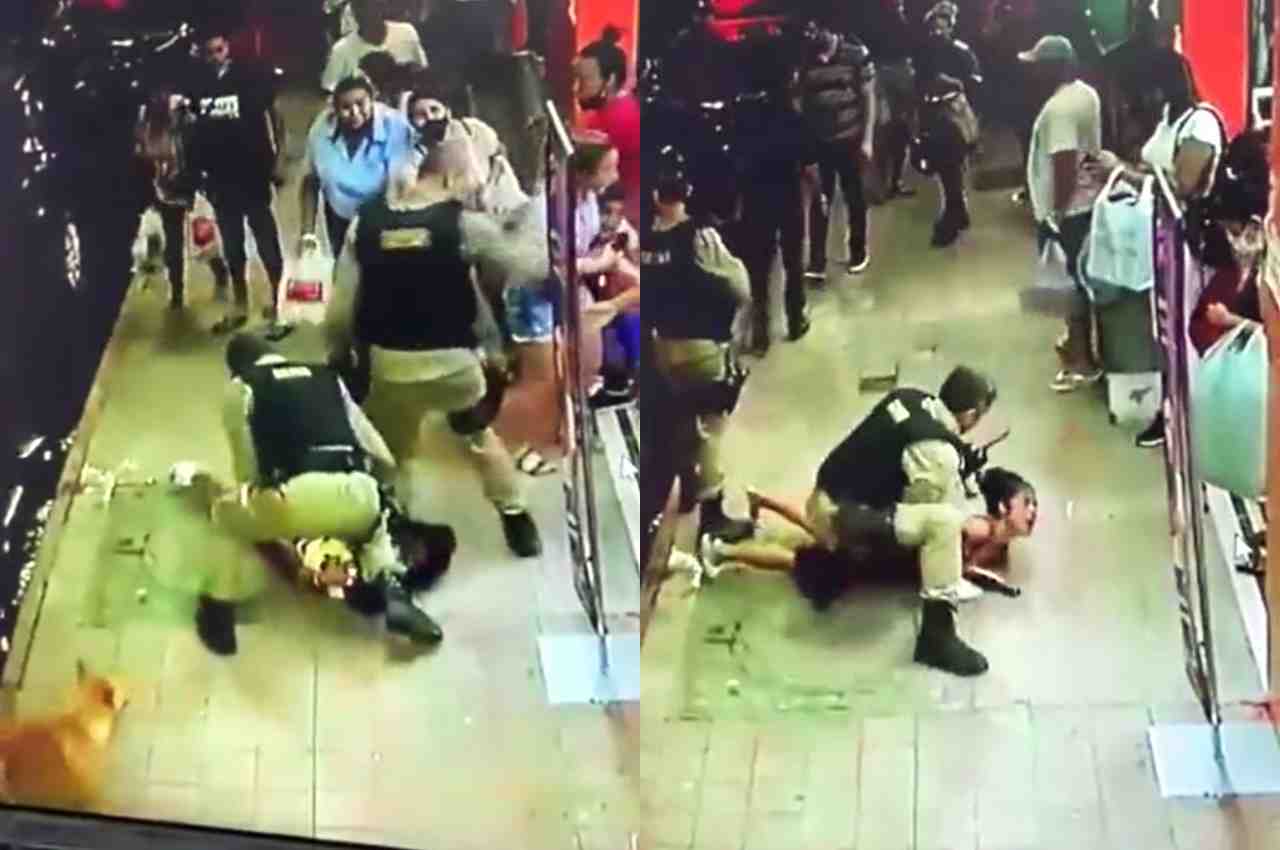 Os policiais militares usaram da força contra a mulher e um deles a imobilizou com o joelho sobre seu pescoço | © Reprodução