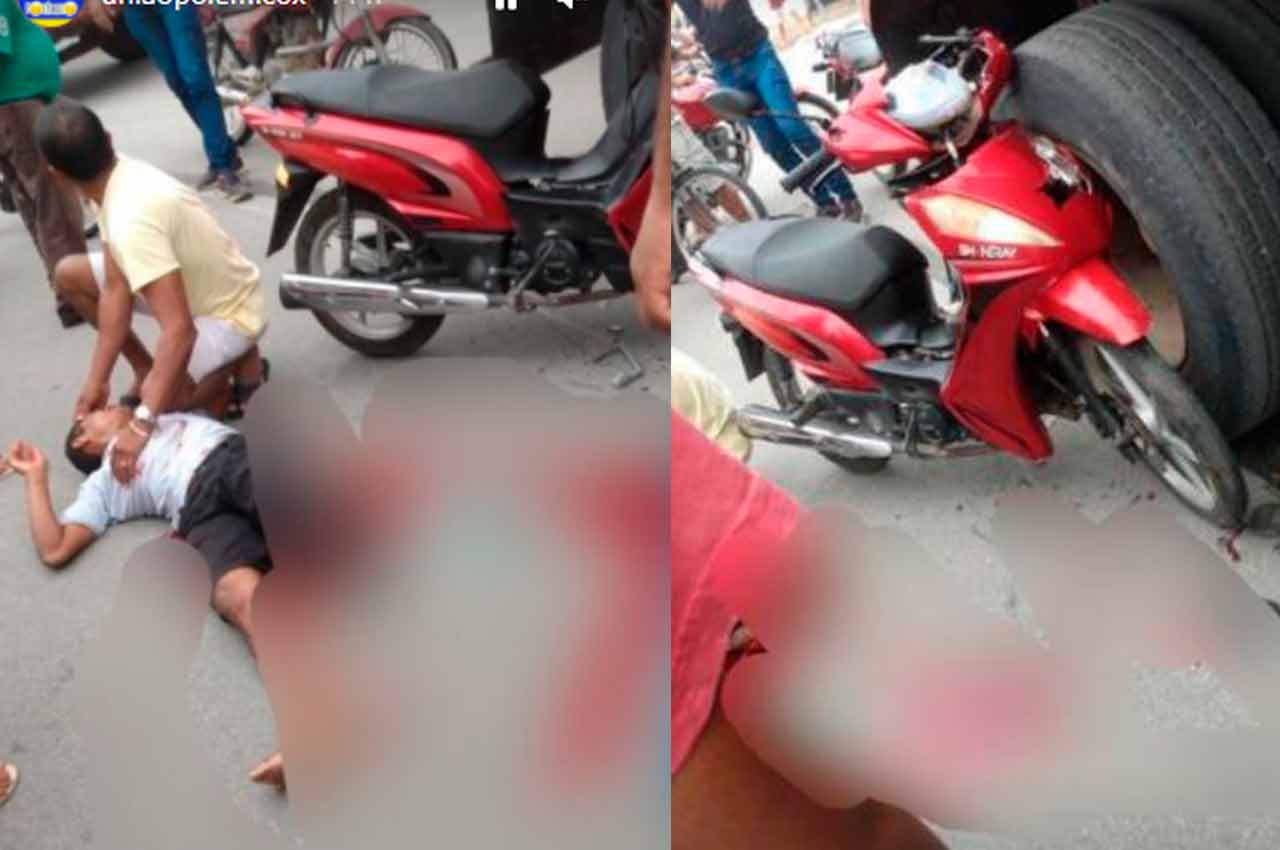 Motociclista caído no chão a espera de socorro | © Reprodução
