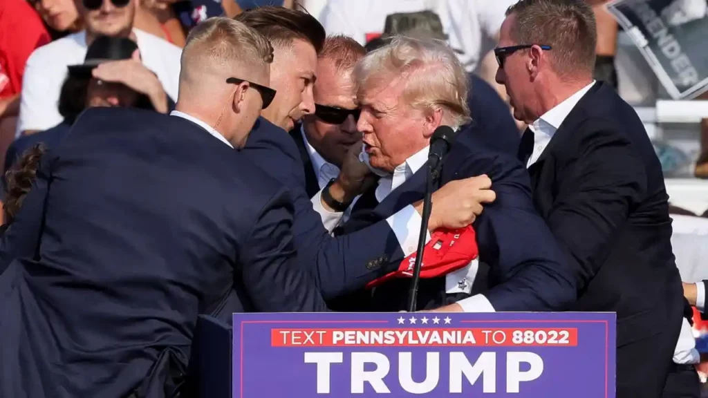 Comício de Trump termina em tragédia: Atirador morto e ex-presidente ferido